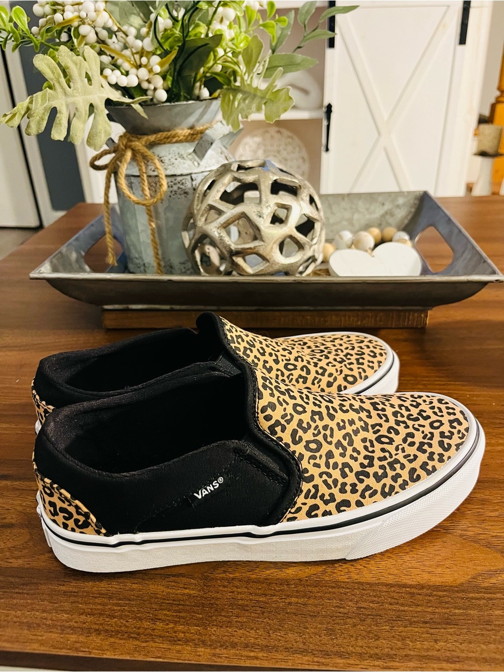 Vans women’s US 7 Leopard Print Slip-On Sneakers in Tan and Black